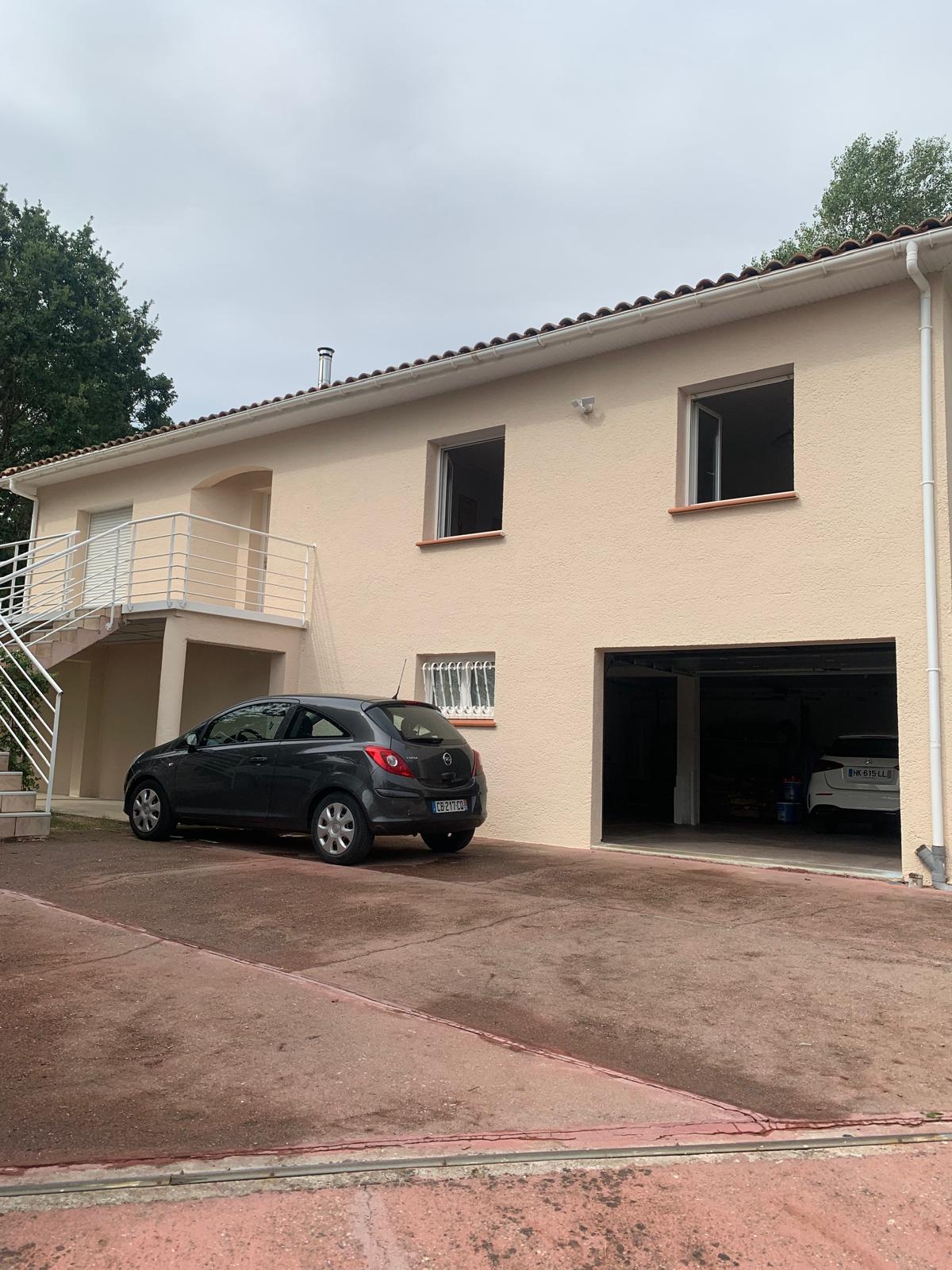 Garage après travaux — rénovation de façade à Péchabou (31320)