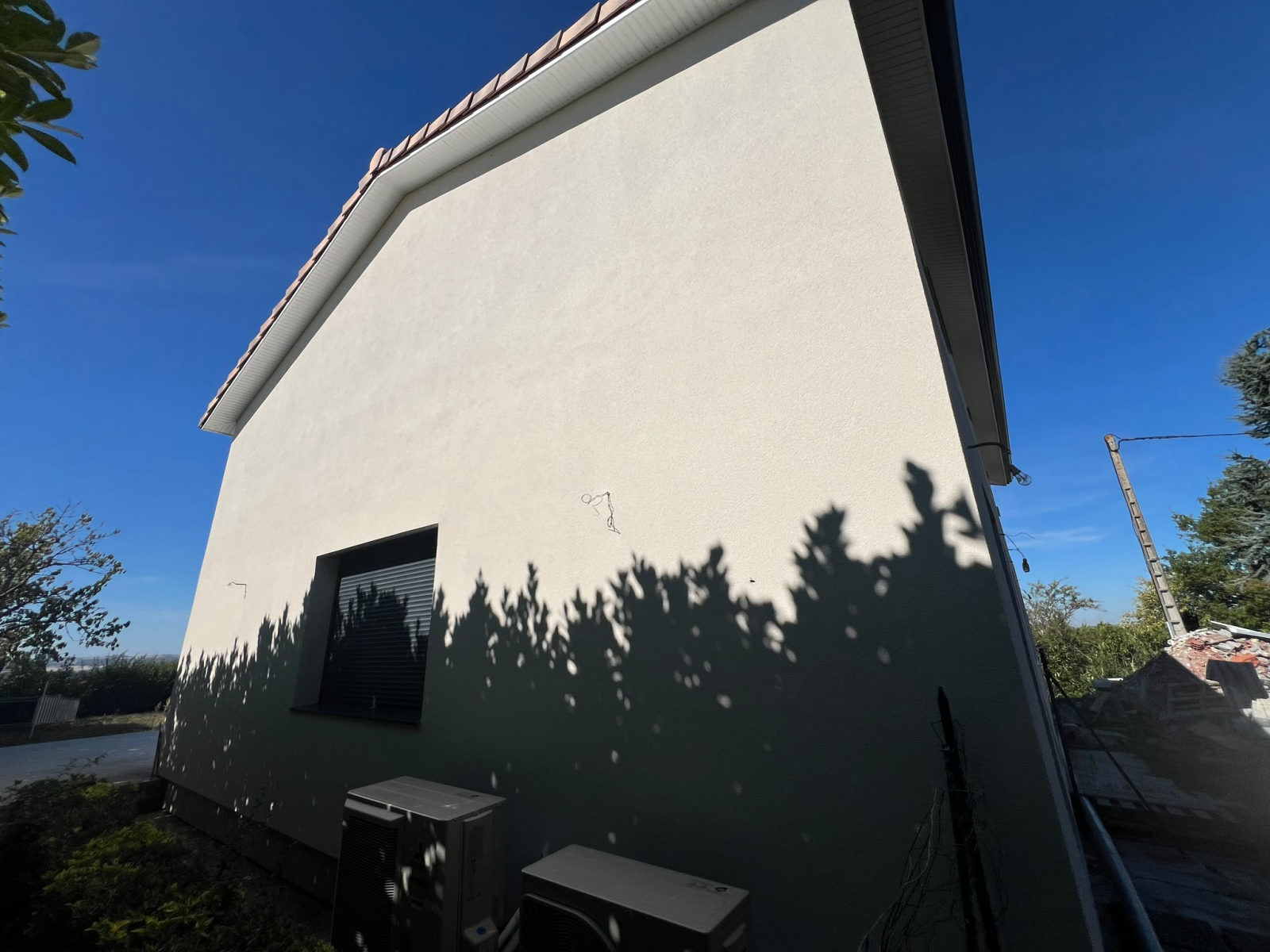 Pignon après travaux — isolation thermique par l'extérieur à Odars (31450)